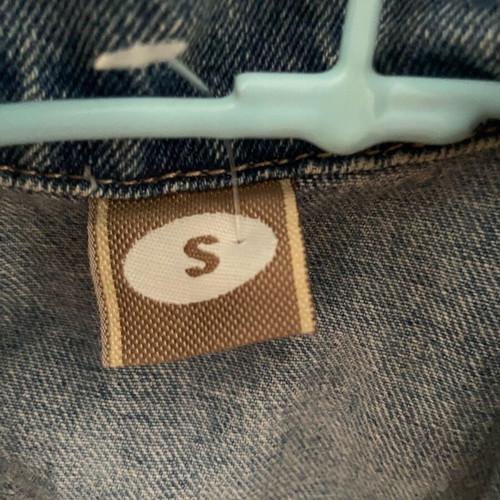 Denim short vest used with iron-on patches