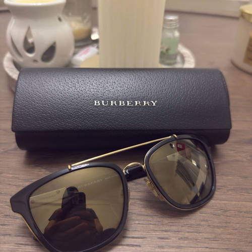 Burberry sunglasses like new, black and gold