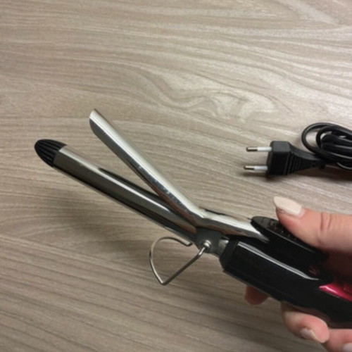 Ceramic curling iron new condition