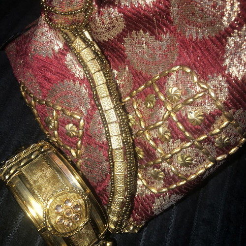 Red gold Indian brocade potli bag like new with bracelet gift