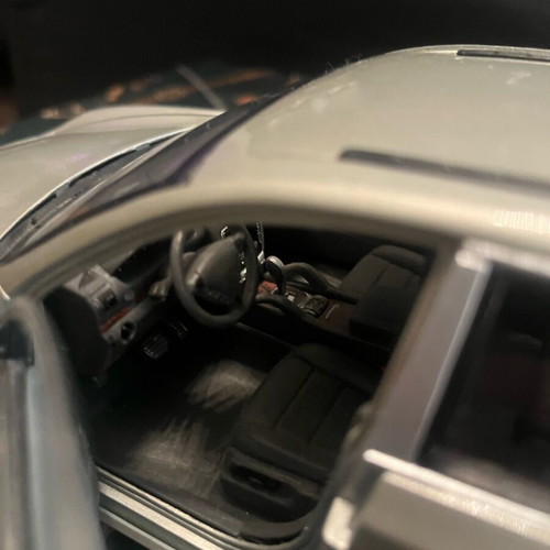 Porsche 1:18 model car used with minor crack on rear left passenger window