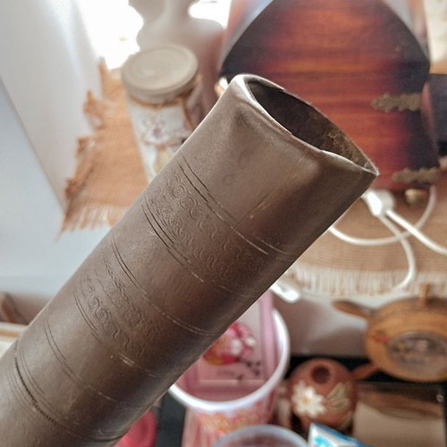 Old traditional brass manual coffee grinder used