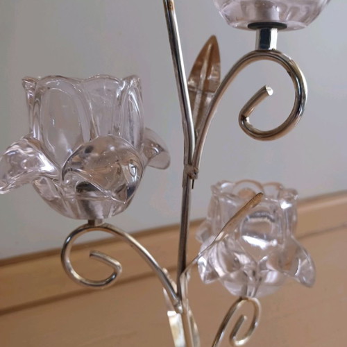 Silver-plated tealight candle holder used with pink flowers