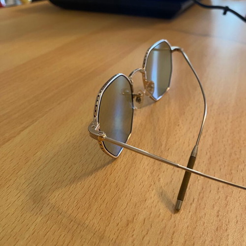Oliver People Takumi sunglasses model TK-5 used with minor scratches