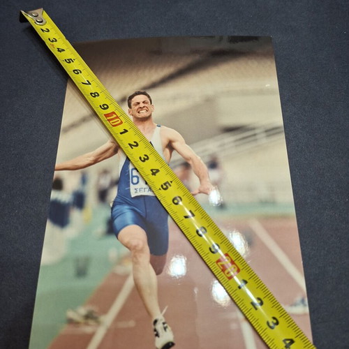 Track and field photo used, 13×20 cm, authentic signature