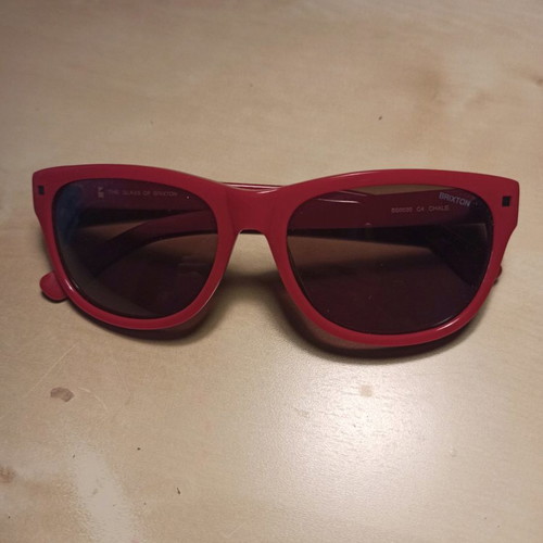 Brixton women's red sunglasses used with 100% UV protection
