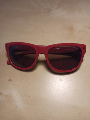 Brixton women's red sunglasses used with 100% UV protection