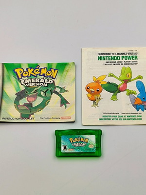Pokemon Emerald Version for Game Boy Advance used with manual and poster