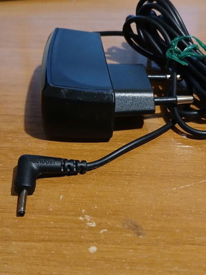 Samsung charger with built-in cable unused