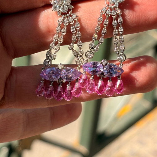 Silver dangling earrings used with zircon stones 5cm length