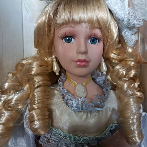 Porcelain doll with stand new, vintage style