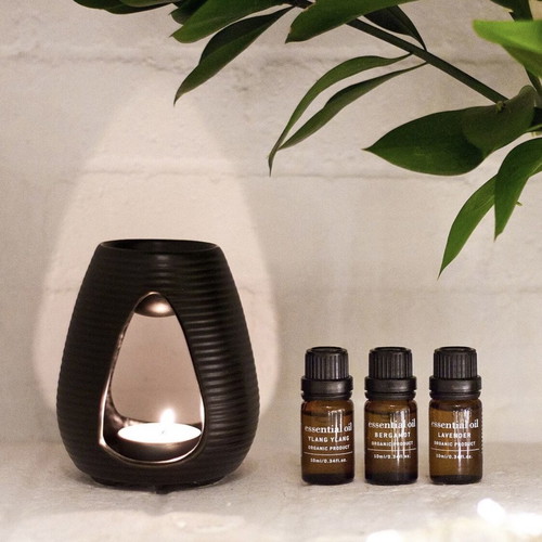 Apivita ceramic essential oils candle holder used