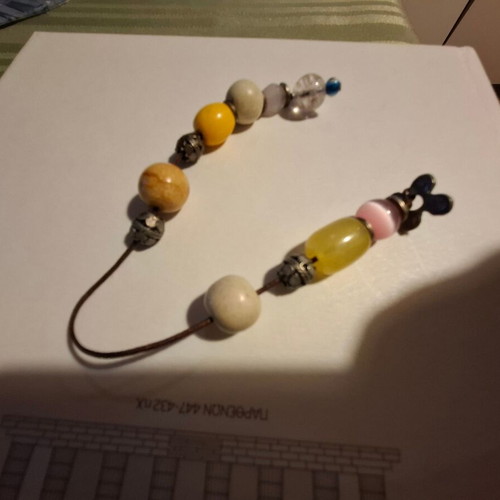 Worry beads used with colorful beads, evil eye and metal element