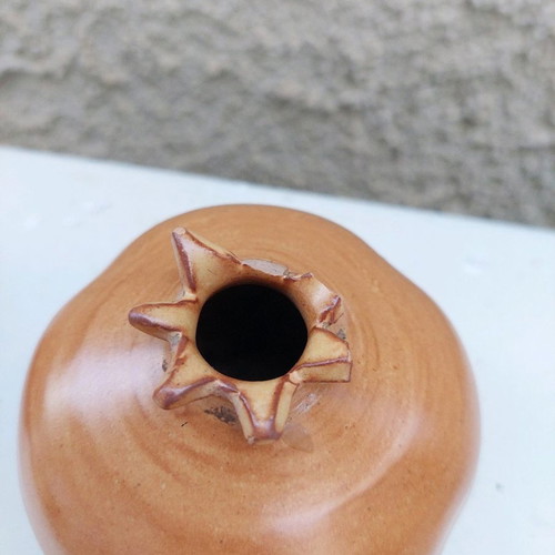 Clay pomegranate used, brown decorative