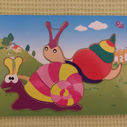 Wooden and paper puzzles used for children