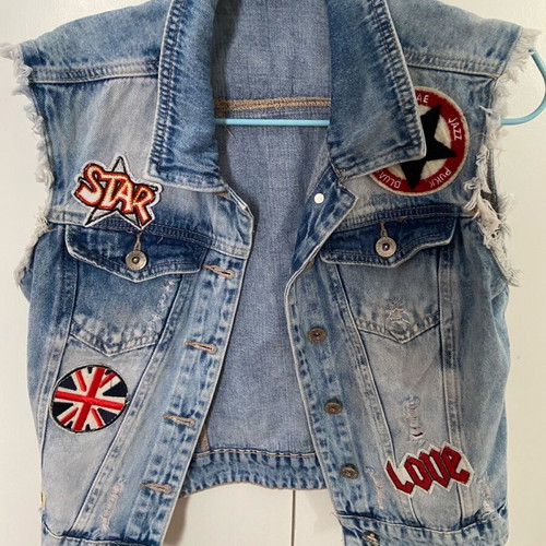 Denim short vest used with iron-on patches