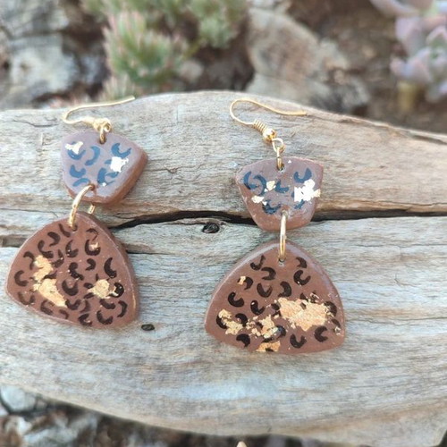 Clay earrings new with painted animal print and gold leaf accents
