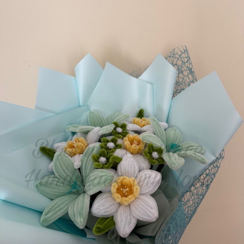 Delicate bouquet of daffodils and lilies custom made in pastel colors