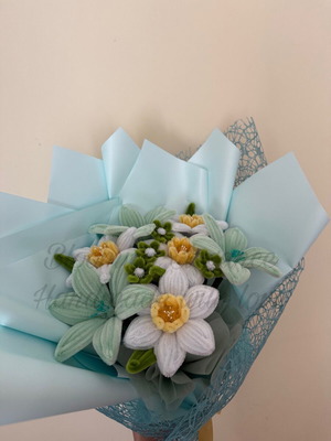 Delicate bouquet of daffodils and lilies custom made in pastel colors