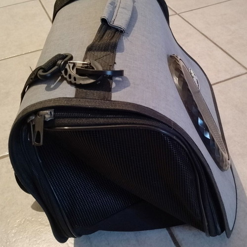 Pet carrier bag used with dog toy