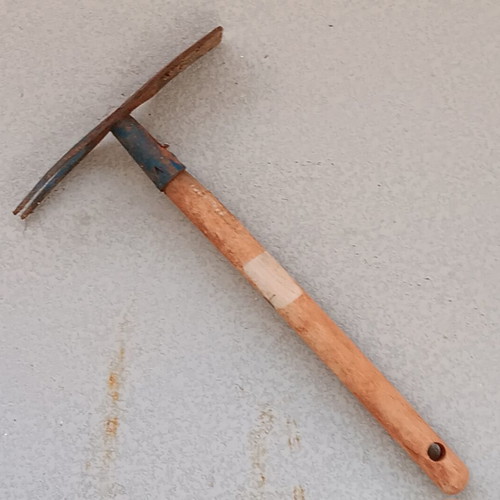 Garden hoe used with wooden handle and double head