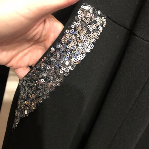 Black one-piece jumpsuit like new with sequin details