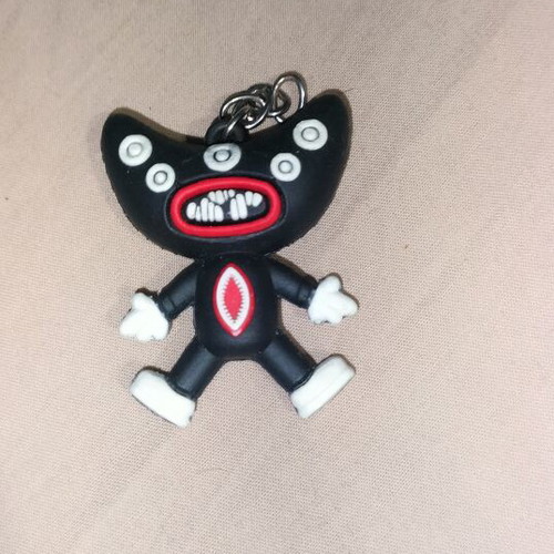 Keychains like new, assorted characters and black bracelet