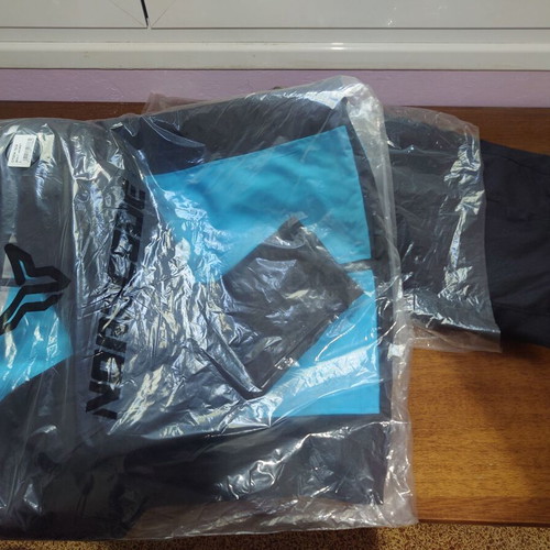 Delivery equipment set new with efood and Wolt shoes, gloves, jacket, and accessories