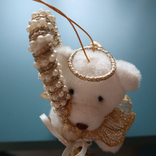 Christmas teddy bear like new with golden caramel and feathers