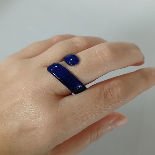 Blue translucent plastic ring like new