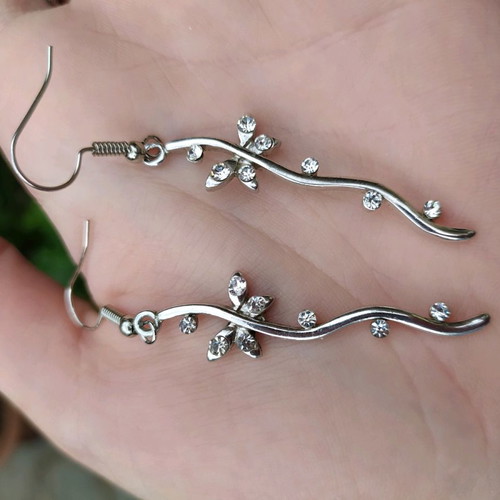 Silver earrings used with stones