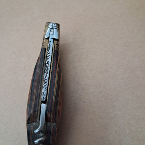 Vintage folding knife like new with multicolored wood handle