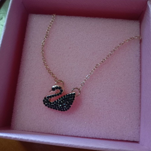 Swan necklace like new, pink gold tone with black stones