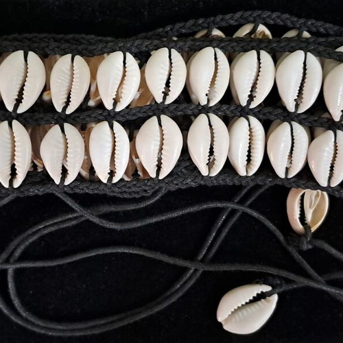 Women’s knitted belt with shells new, length 70 cm