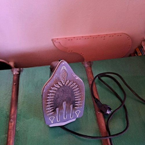 Steam iron used, as shown
