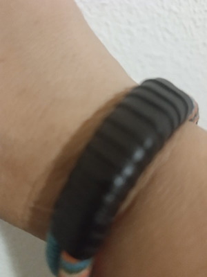 Men's bracelet like new with leather and colorful yarn