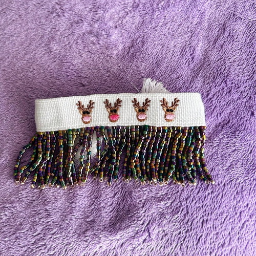 Christmas bracelet handmade, new with reindeers and beaded fringe