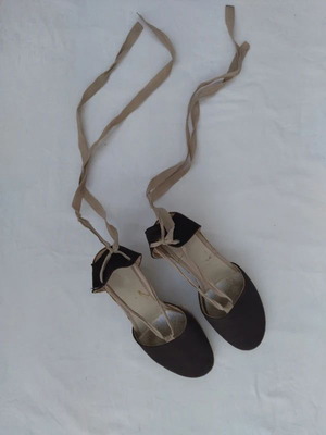 Brown espadrille platform shoes used with ankle ties