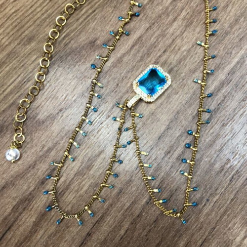 Necklace new with unique chain design and blue stone