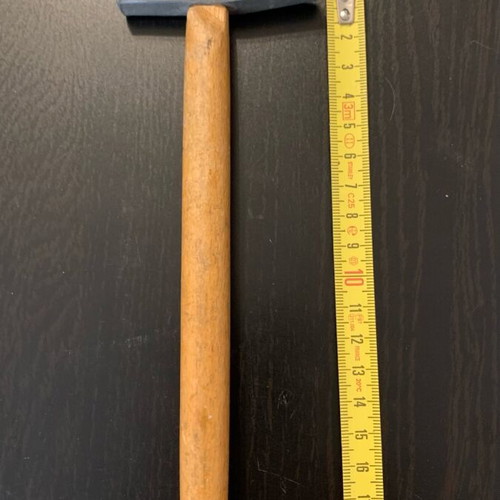 Small hammer used, as shown