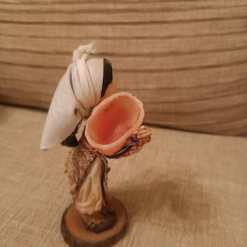 Decorative doll used with traditional costume