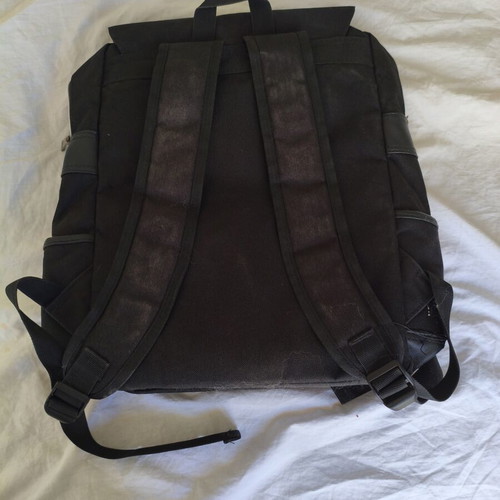 Backpack canvas black used with multiple compartments