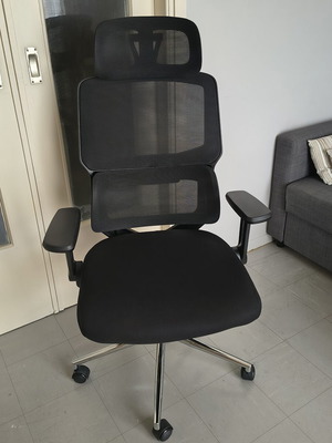 Office chair new with 1 year warranty and adjustable armrests