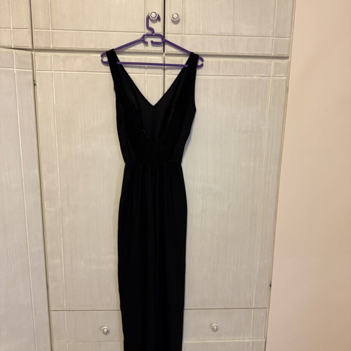 Pink Woman black jumpsuit with open back