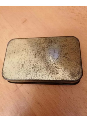 Meggezones vintage metal box for throat pastilles, used