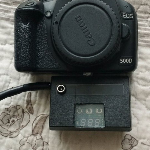 Canon EOS 500D DSLR camera used, modified for astrophotography with cooling