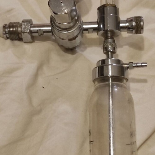 Oxygen Flow Regulator with Sphygmomanometer used, humidifier bottle