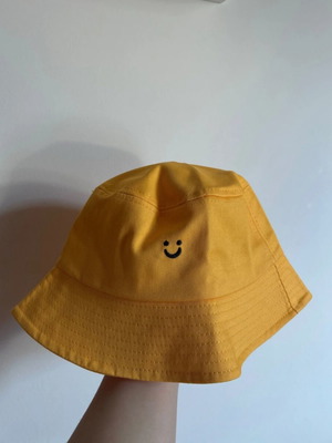 Hat new, orange with adjustable cords