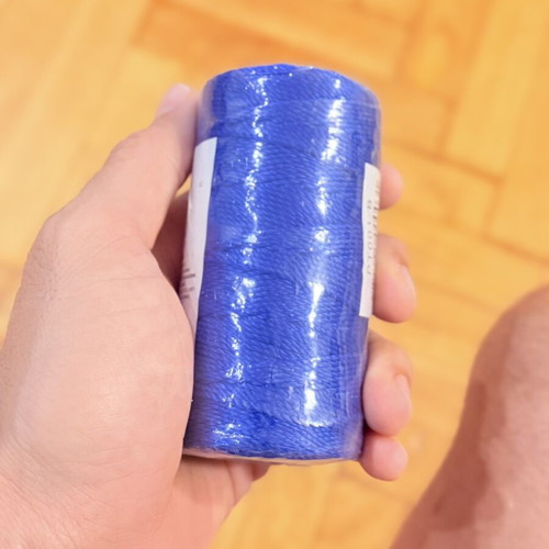 Plastic blue twine new in cellophane
