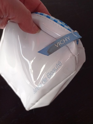 Vichy toiletry bag used, white glossy